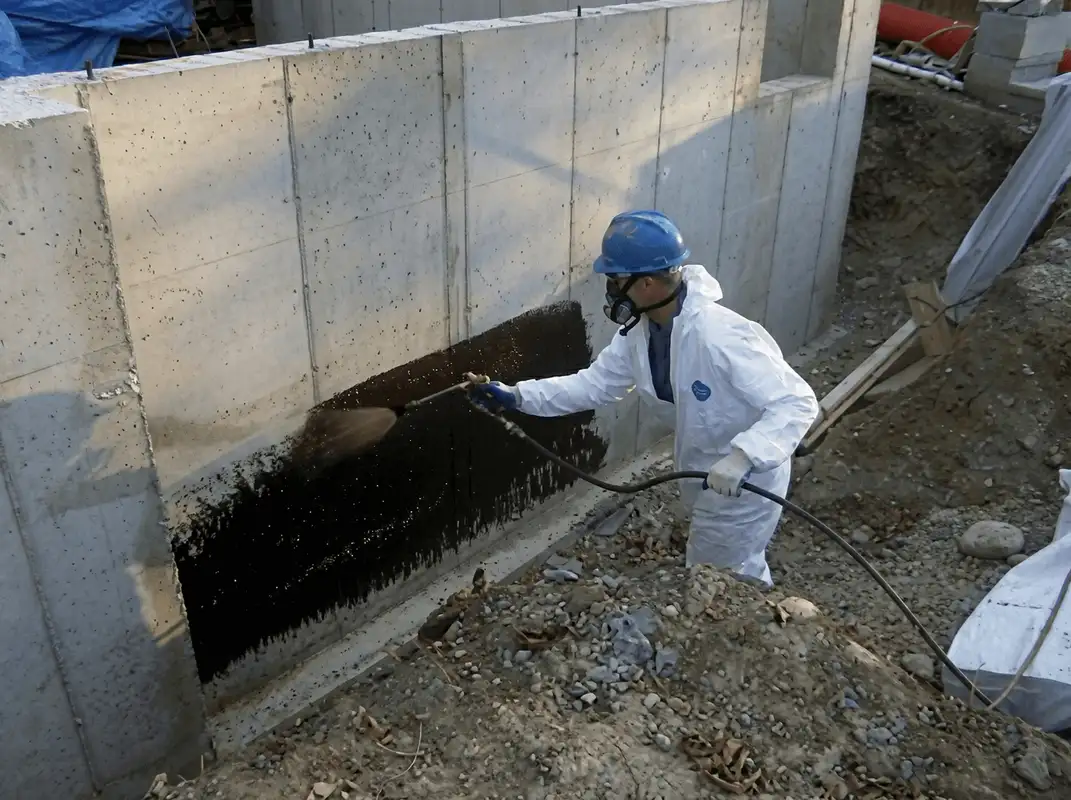 Professional waterproofing the exterior walls of the basement in Jacksonville, FL