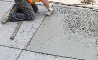 Professional repairing a concrete floor in Jacksonville, FL