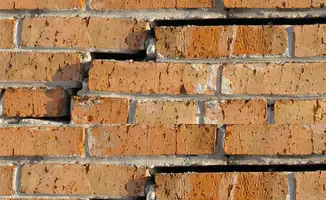 Brick wall with serious structural damage in Jacksonville, FL
